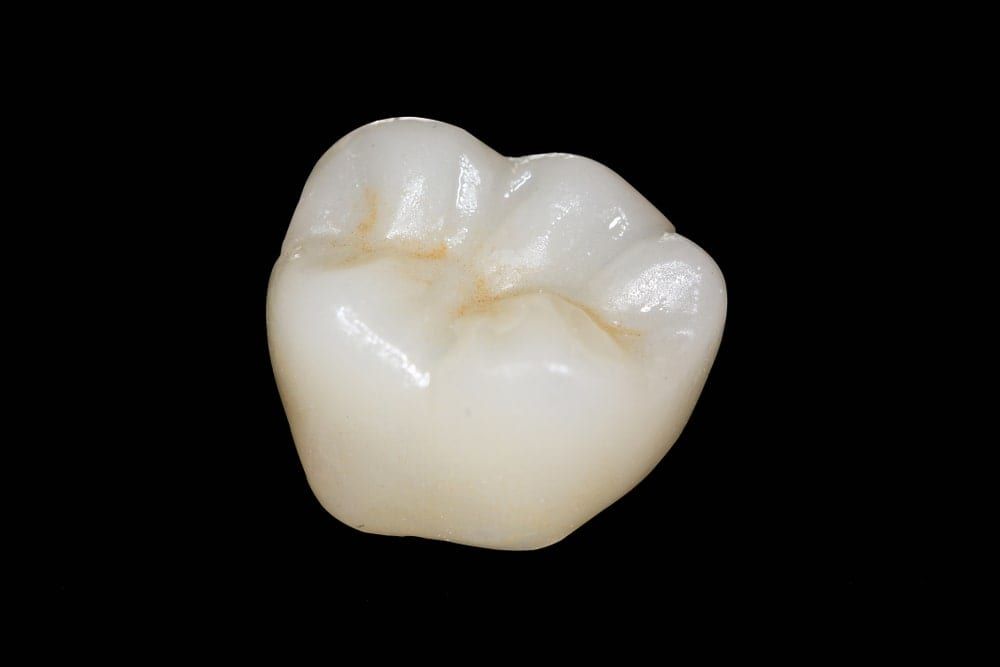 zirconia crown on a black background