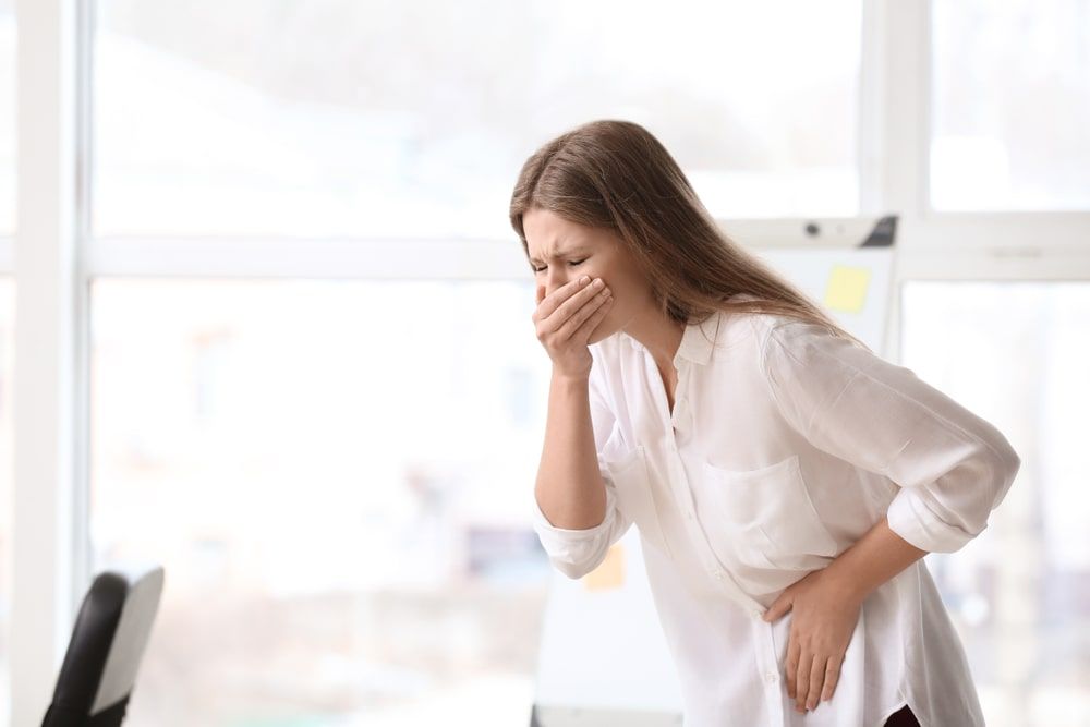 Pregnant woman suffering from morning sickness