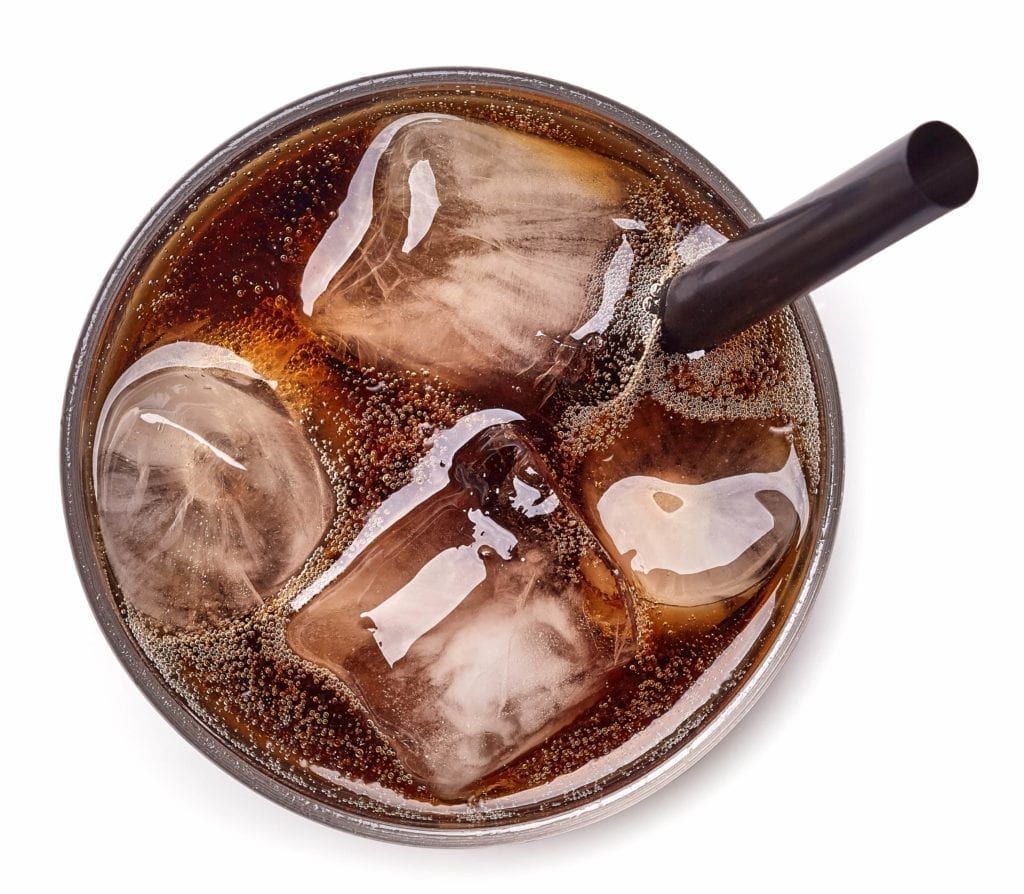 Soft drink with a straw