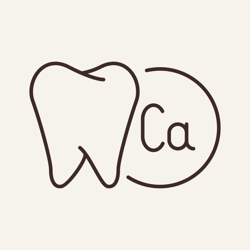 calcium symbol besides drawing of tooth
