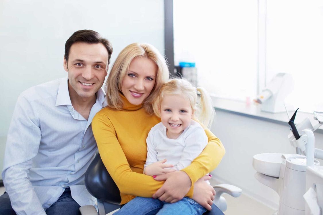 young family smiling